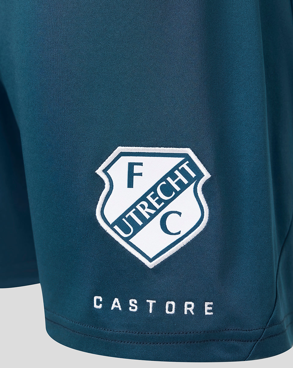 Close up of FC Utrecht away shorts fabric with crest patch and Castore branding.