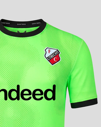 Bright neon green FC Utrecht goalkeeper jersey with crest on the left chest and bold sponsor text across the front.