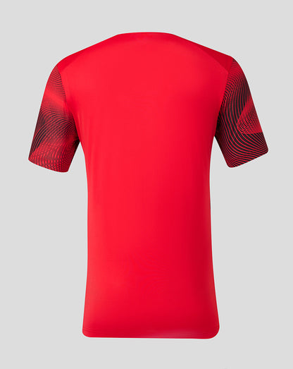 Back view of FC Utrecht red matchday shirt with black patterned sleeves.