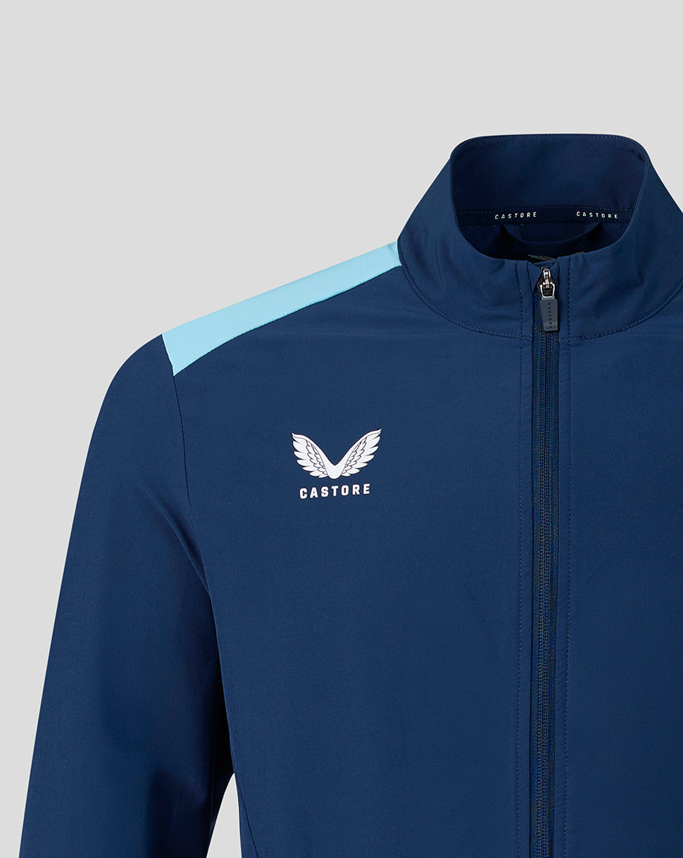 Athletic Club jacket close up with crest on the chest and Castore branding.