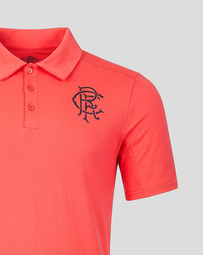 Red polo shirt with a black logo on a light gray background