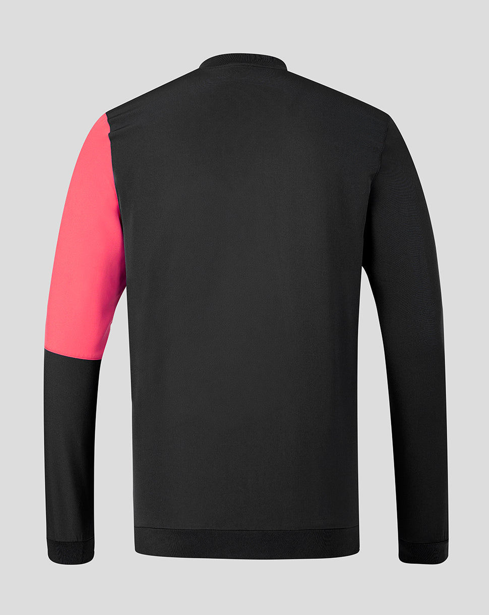 Black jacket with pink sleeves on a gray background