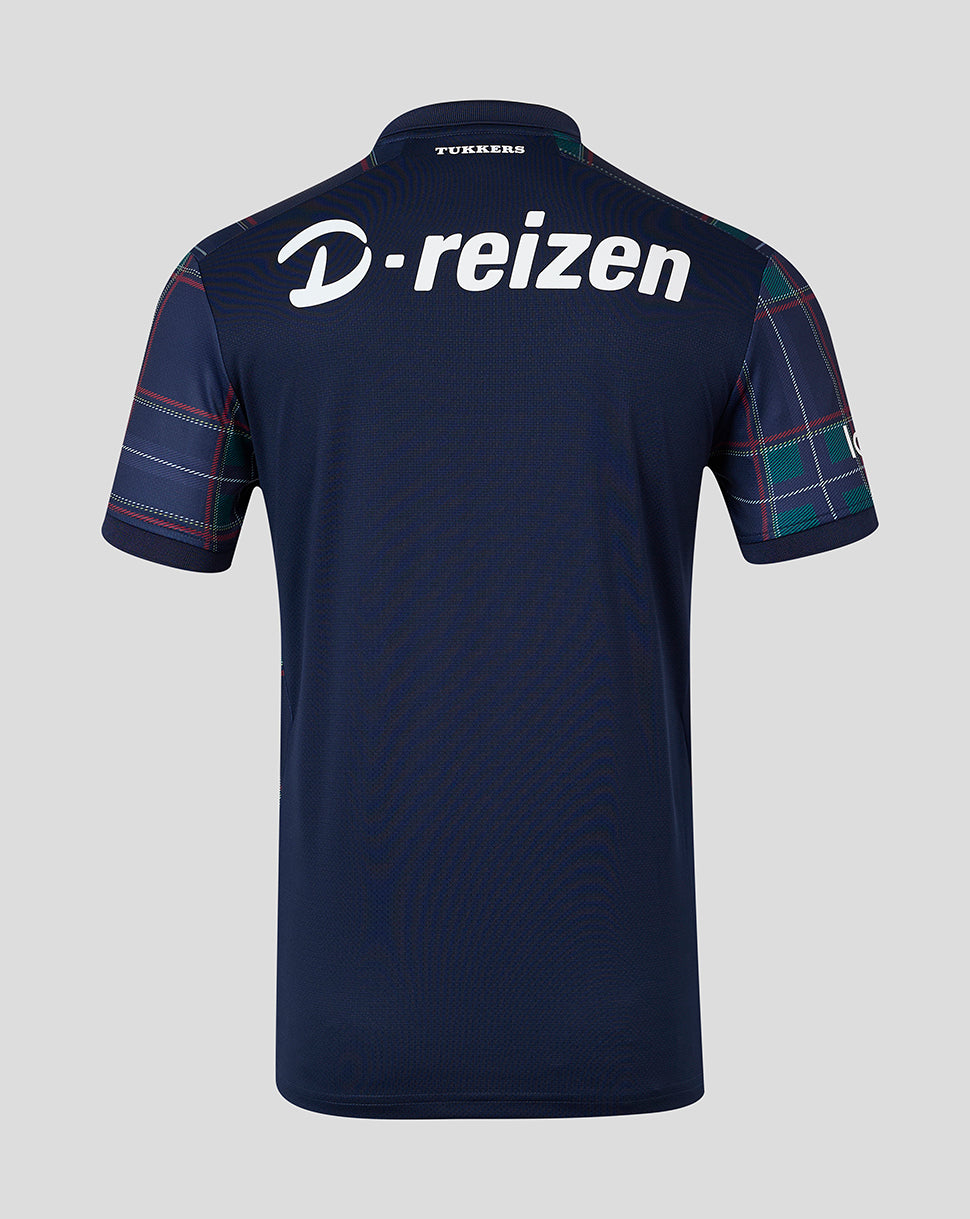 Back view of a dark navy blue short-sleeve polo shirt with 'D-reizen' in white across the upper back and a tartan plaid pattern on the sleeves, shown on a light gray background.