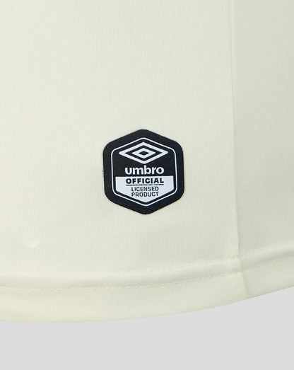 Umbro logo on a light-colored garment