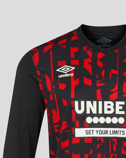 Black and red sports jersey with Umbro logo on a gray background