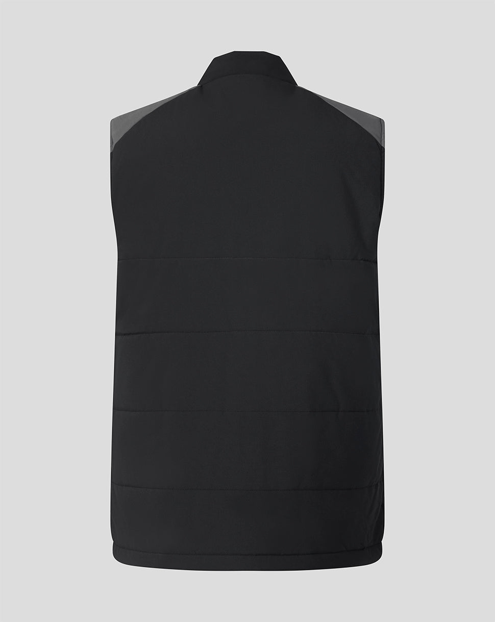 Back view of black FC Twente training gilet with quilted horizontal panels.