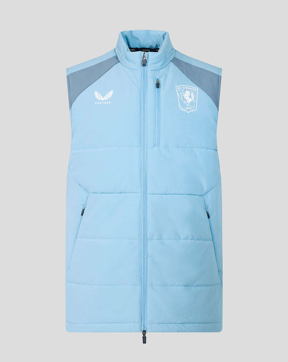 Front view of a light blue FC Twente training gilet with quilted panels crest on the chest and Castore logo.