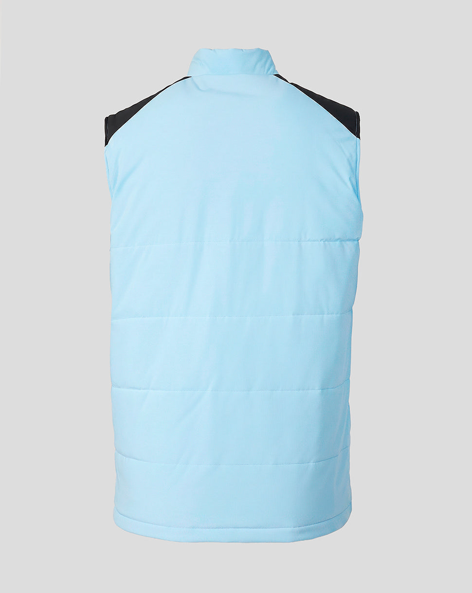 Back view of a light blue quilted unisex training gilet with black shoulder panels