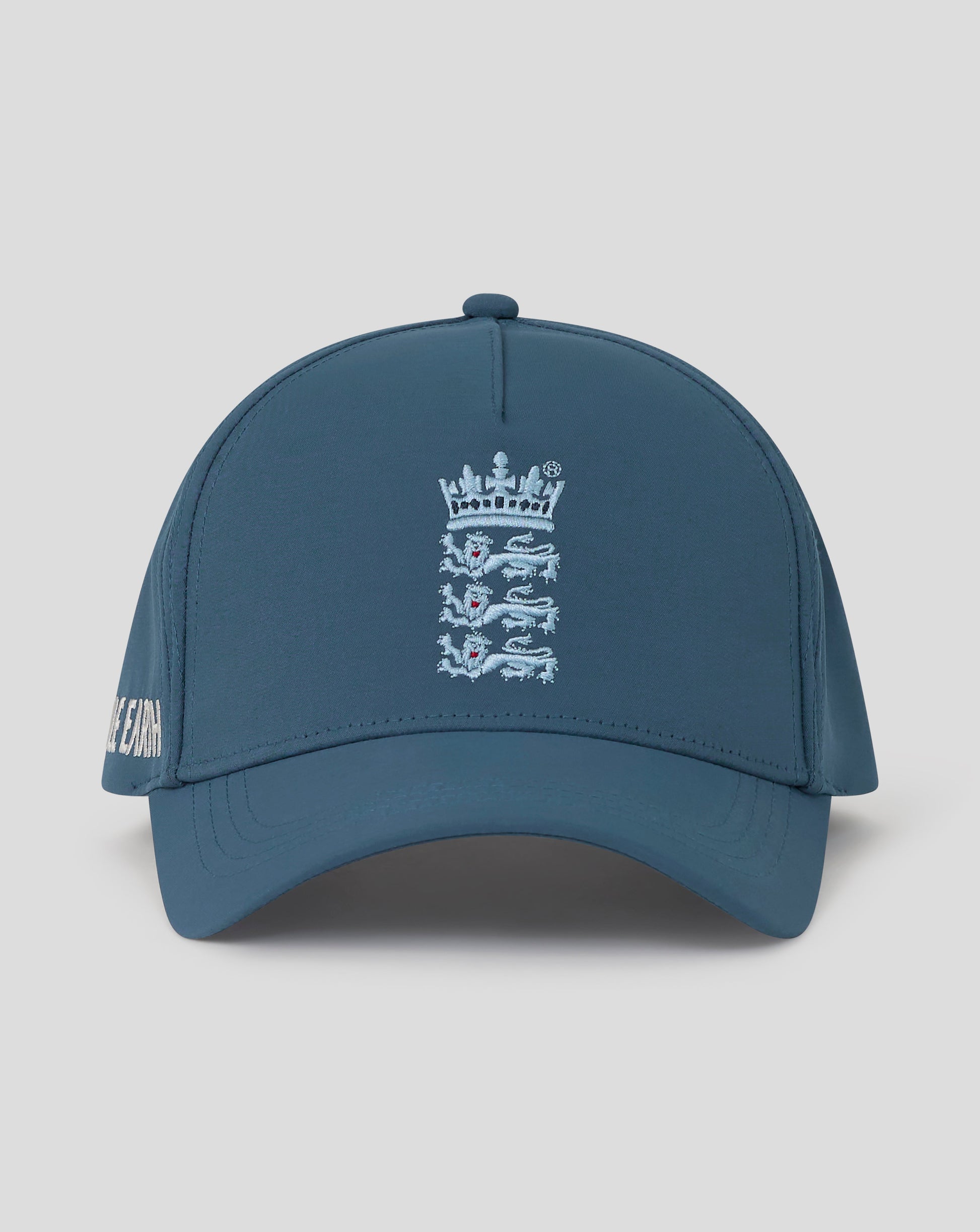 Blue cap with a logo on a light gray background