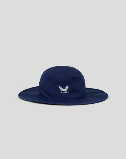 Navy blue bucket hat with a logo on a light gray background
