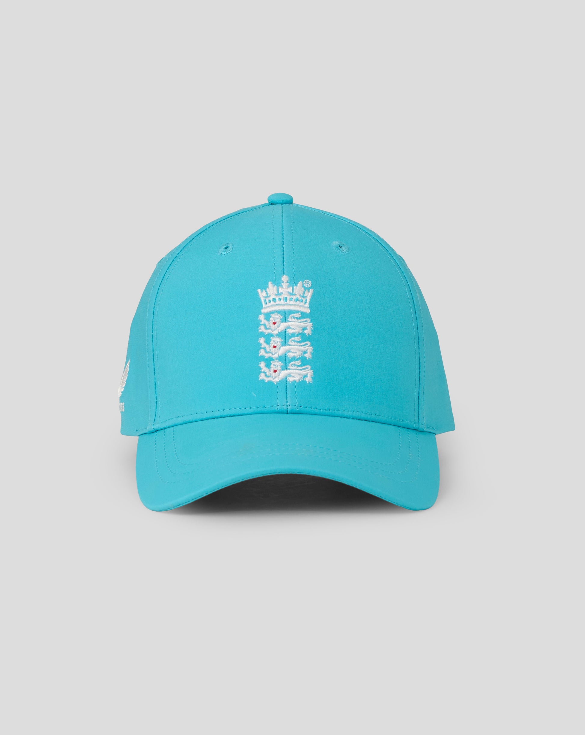 Blue cap with a white logo on a gray background