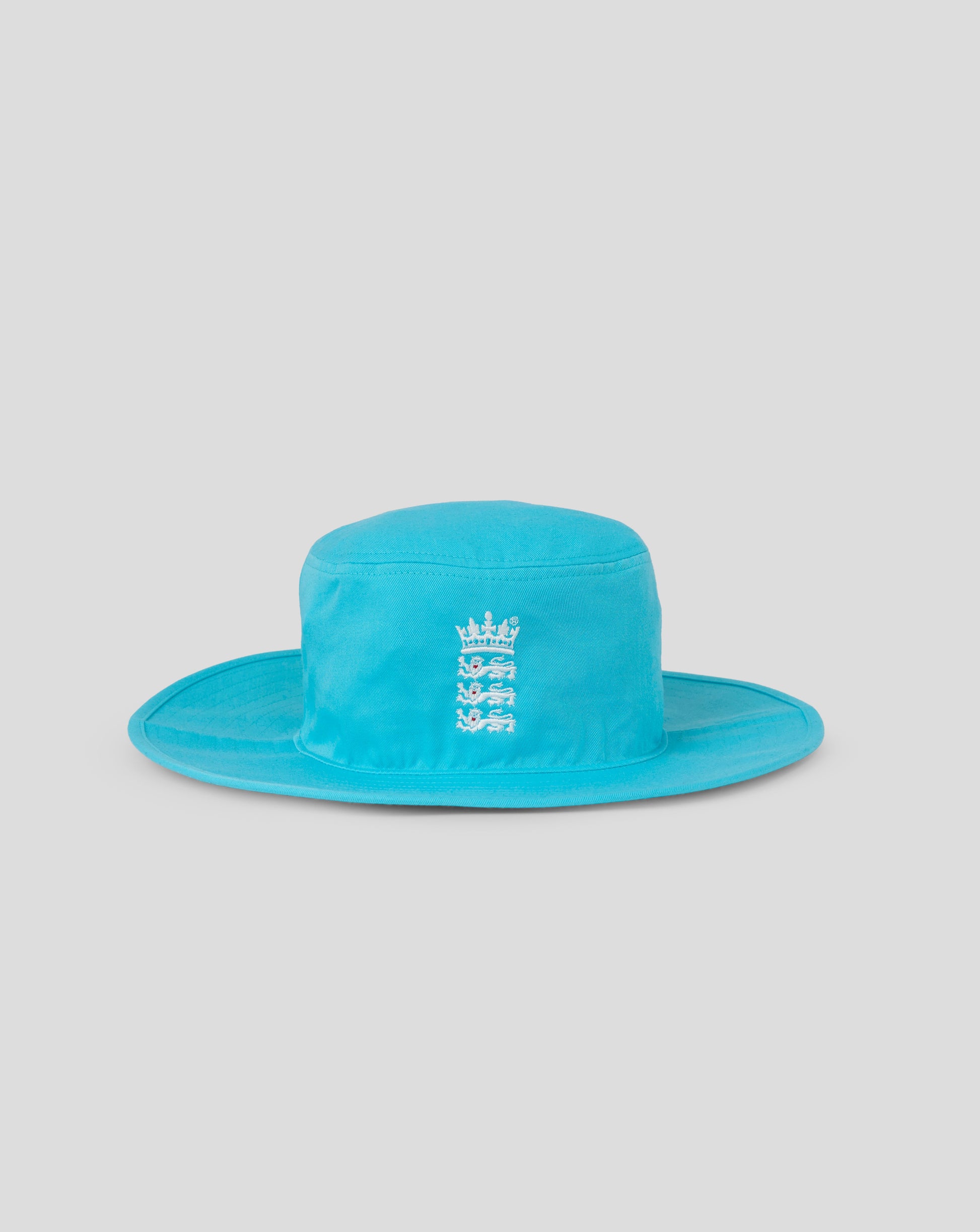 Turquoise bucket hat with a logo on a light gray background