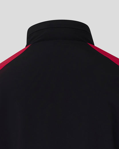 Black jacket with red accents on a light gray background