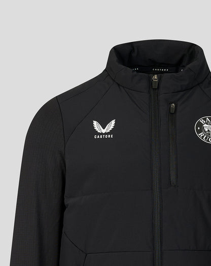 A close-up of a black athletic jacket featuring a white winged logo with the word 'CASTORE' on the left chest and a circular crest on the right chest, set against a solid light gray background.