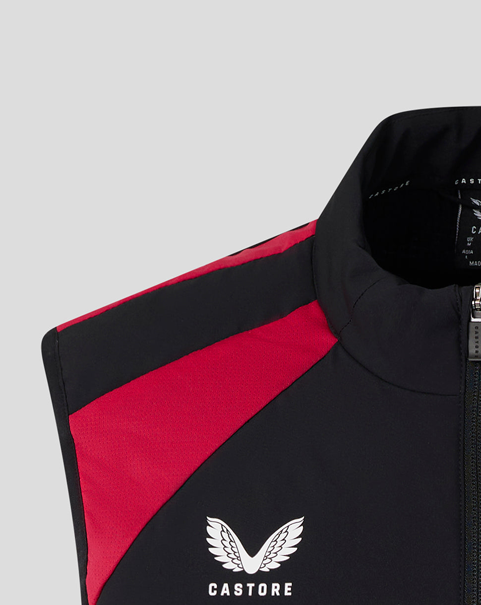 Black and red jacket with Castore logo on a light gray background