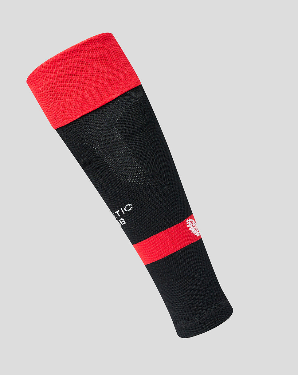Athletic Club unisex home footless sock in black with red accents.