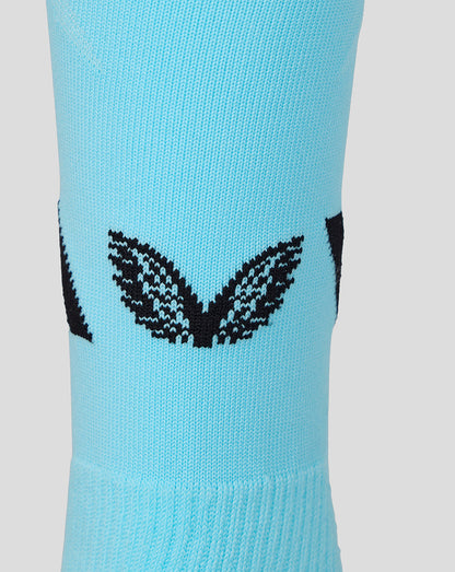 Close-up of a light blue Athletic Club third footless sock with a black wing pattern.