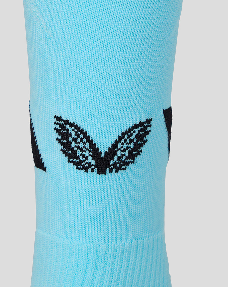 Lower leg view of a turquoise Athletic Club Junior 26/27 third sock showing ATHLETIC CLUB lettering and bold black chevrons.