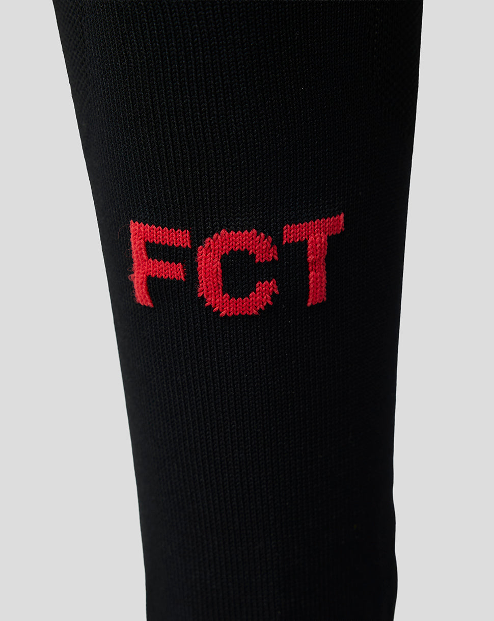 Black FC Twente away sock with red FCT embroidery