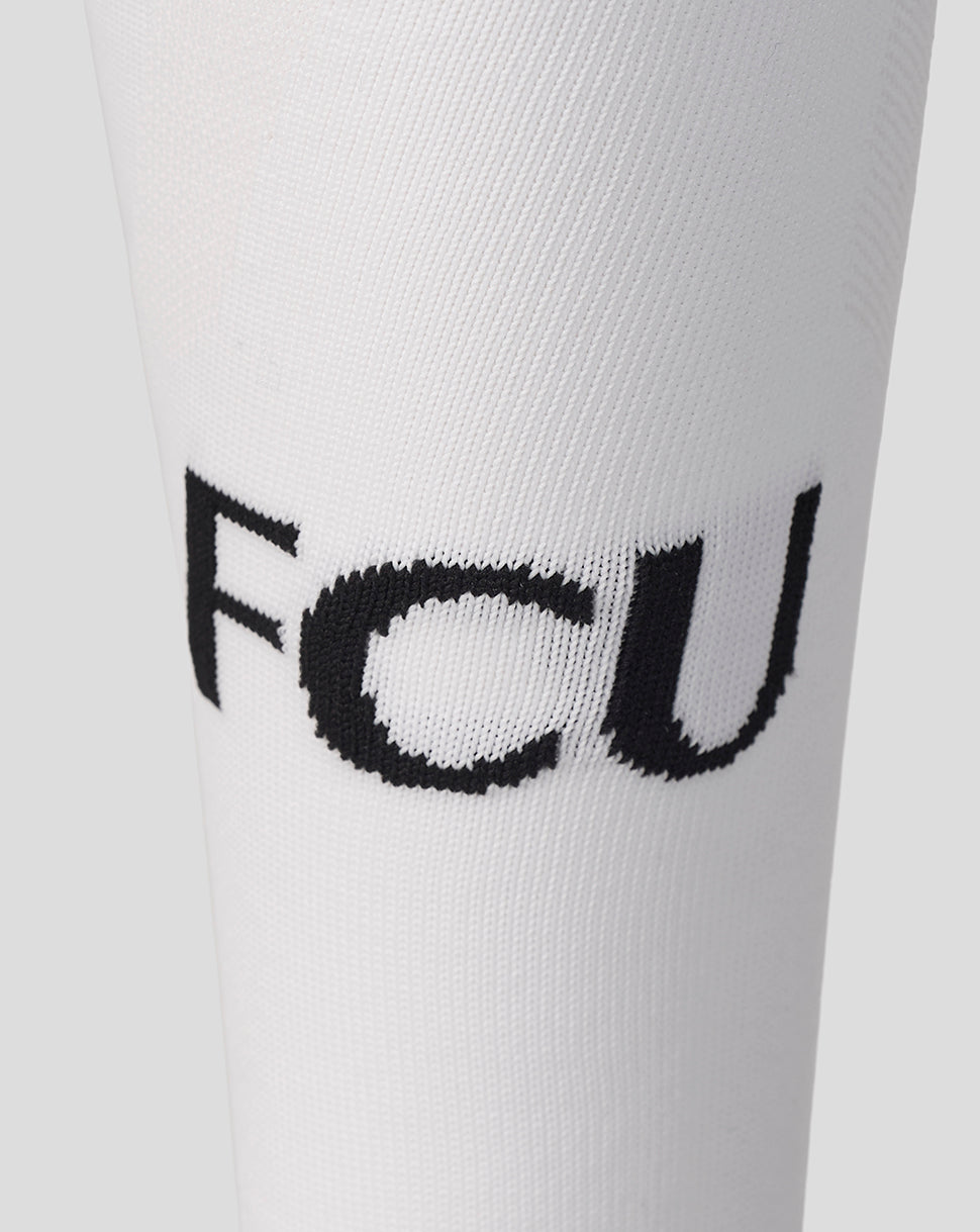 White FC Utrecht home sock close-up with black knit branding.