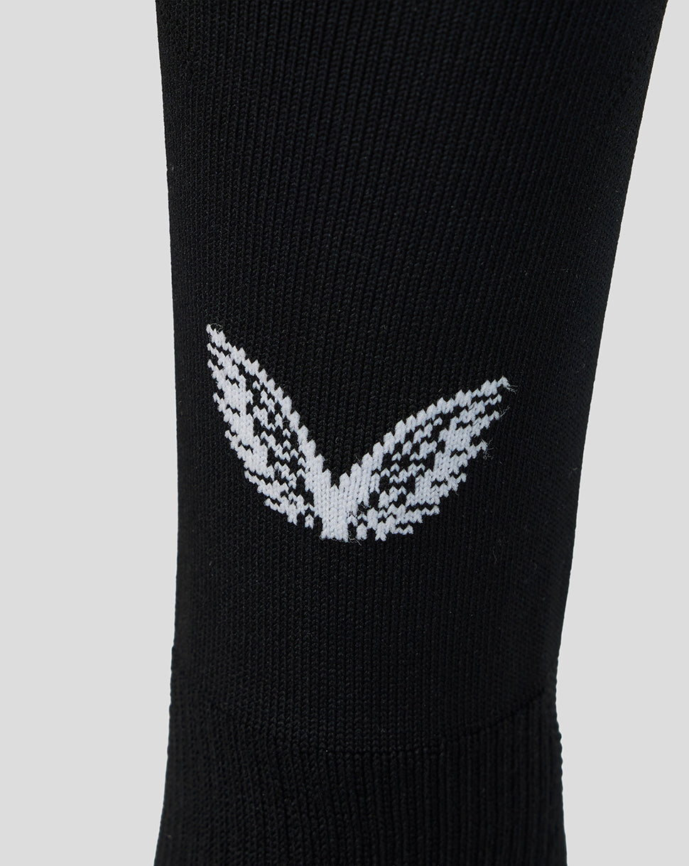 Close up of black Athletic Club home goalkeeper sock with a white logo