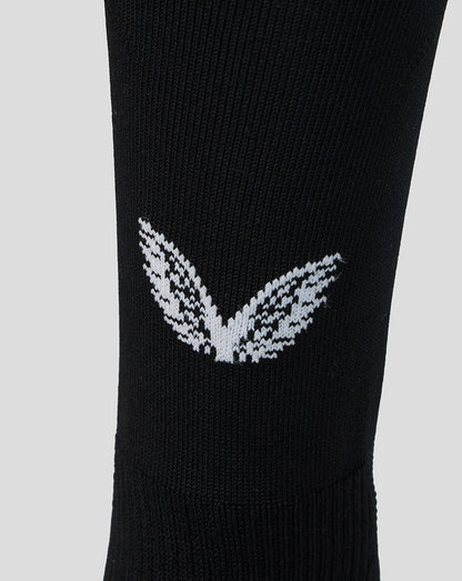 Close up of black Athletic Club home goalkeeper sock with a white logo