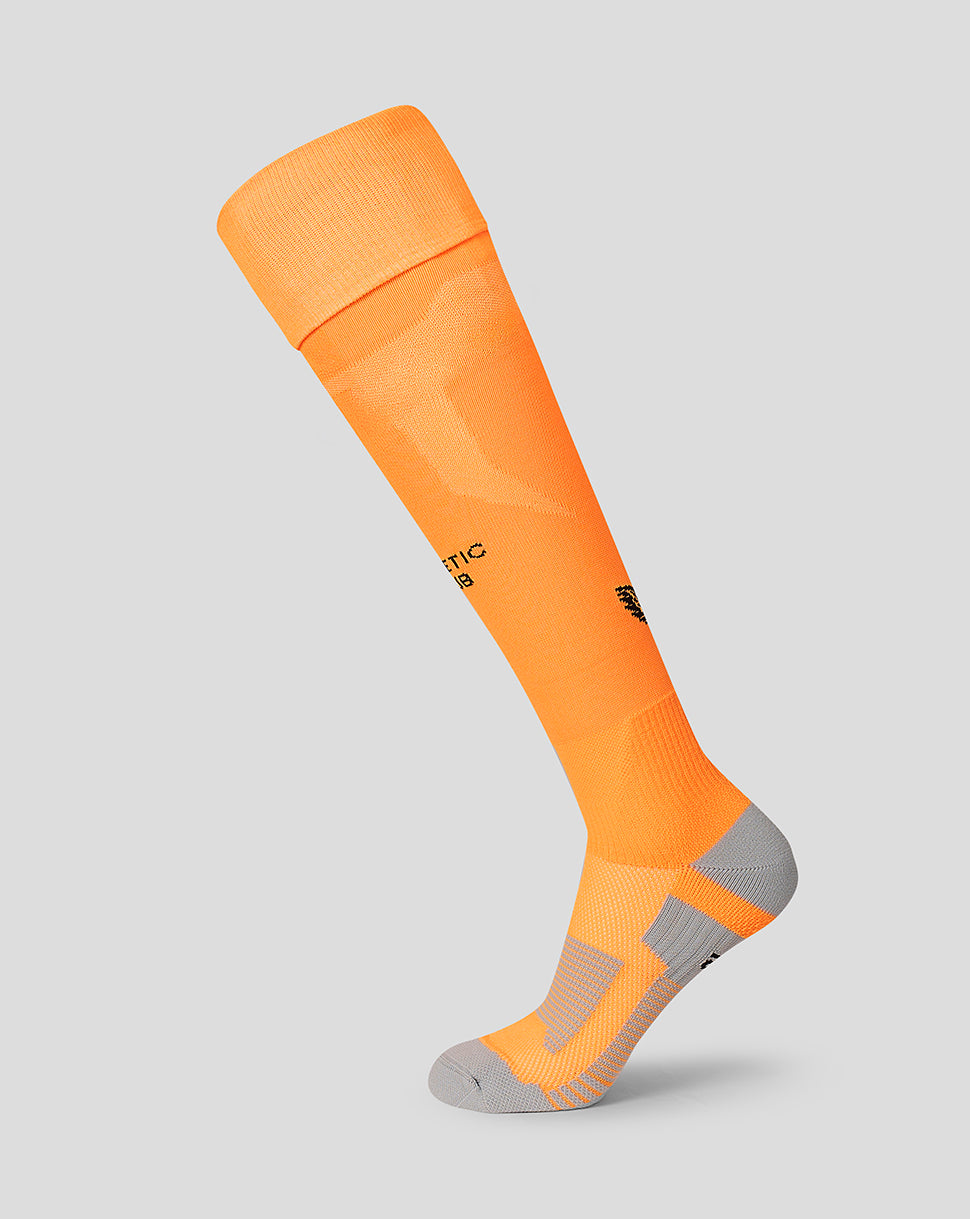 Bright orange unisex Athletic Club third goalkeeper sock with grey heel and toe on a light gray background.