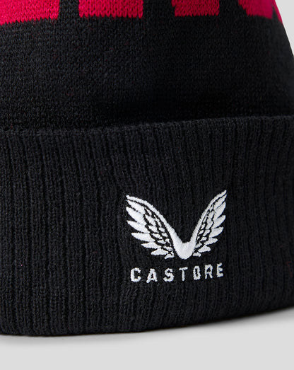 Black beanie with red stripes and Castore logo on a white background