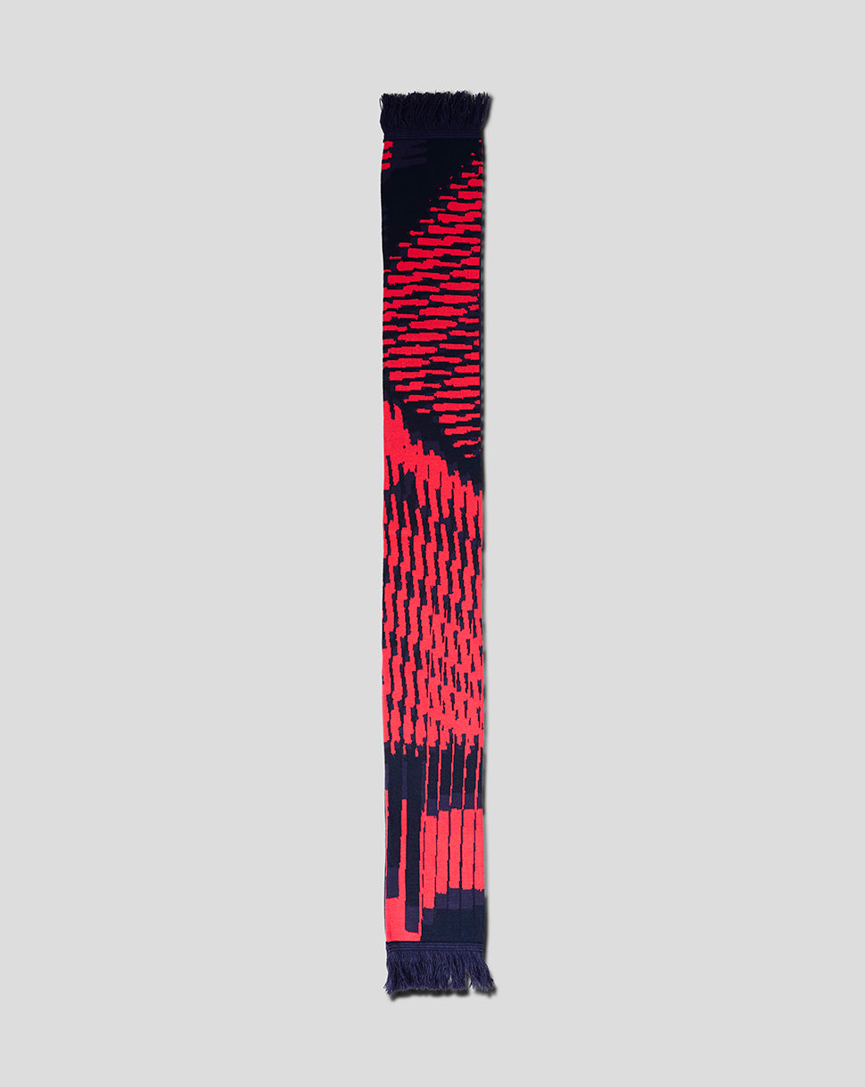 Black and red patterned scarf on a light gray background
