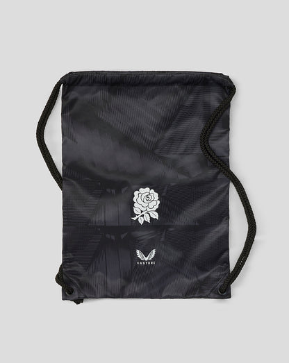 Black drawstring bag with white rose design and brand logo on a light gray background