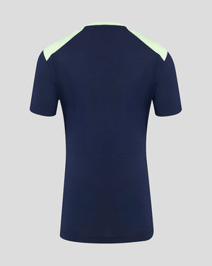 Back view of navy women's training T shirt with pale mint shoulder panels.