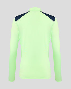 Chaqueta de entrenamiento para mujer verde neón vista desde atrás con paneles azul marino en los hombros