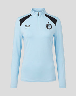 Front view of light blue Feyenoord women's training midlayer with black shoulder panels and crest