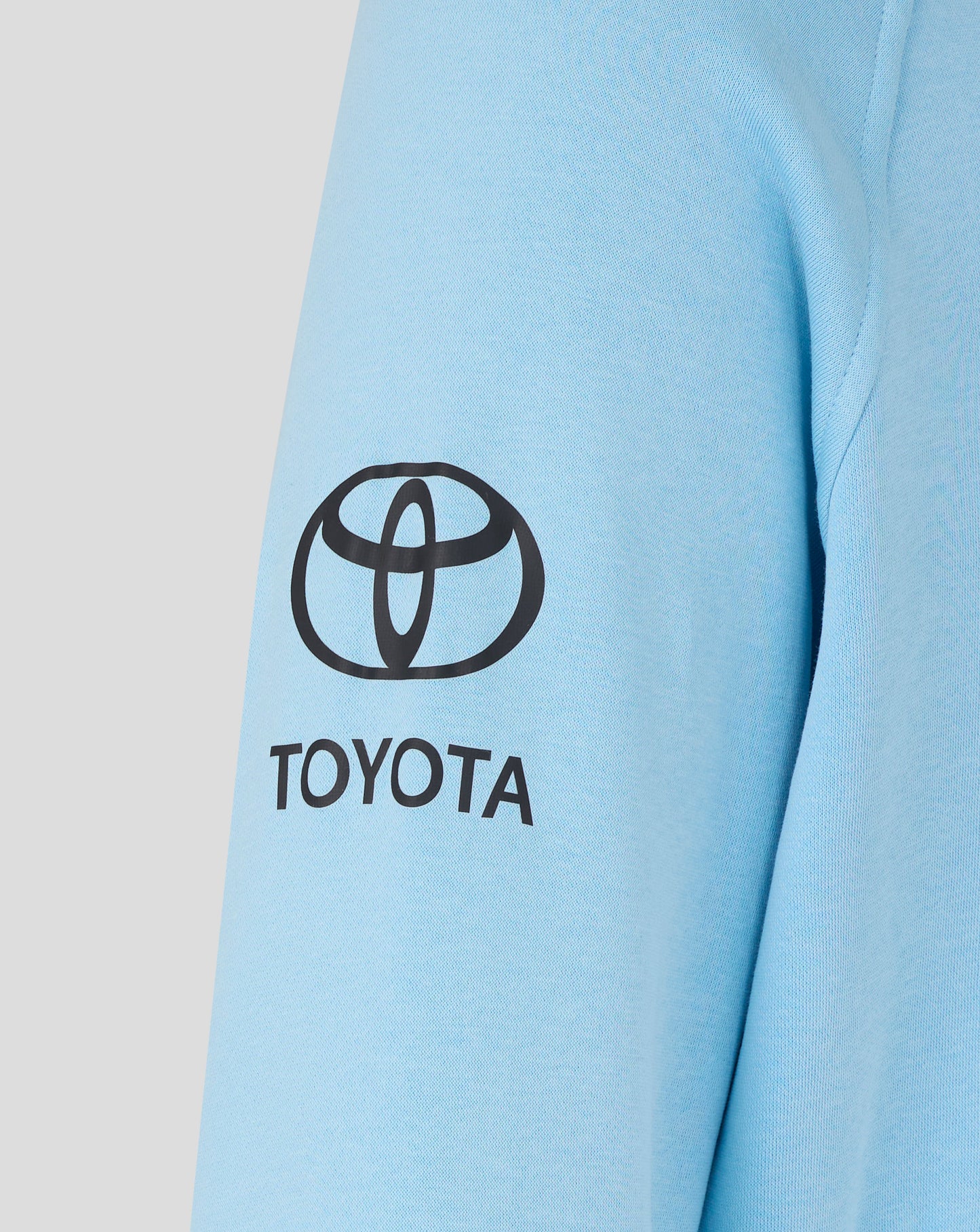 Light blue sleeve with Toyota logo on a light gray background