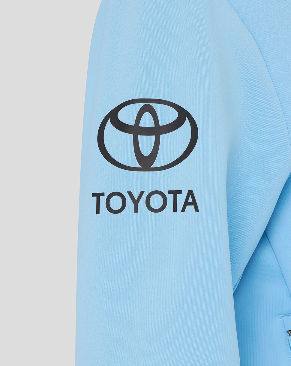 Light blue jacket with Toyota logo on a light gray background