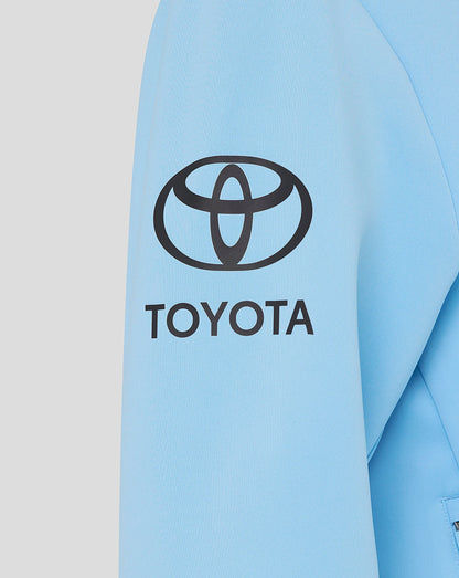 Light blue jacket with Toyota logo on a light gray background