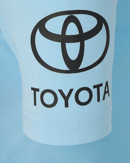 Toyotas logo on a light blue background