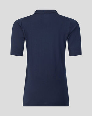 Navy blue polo shirt on a light gray background