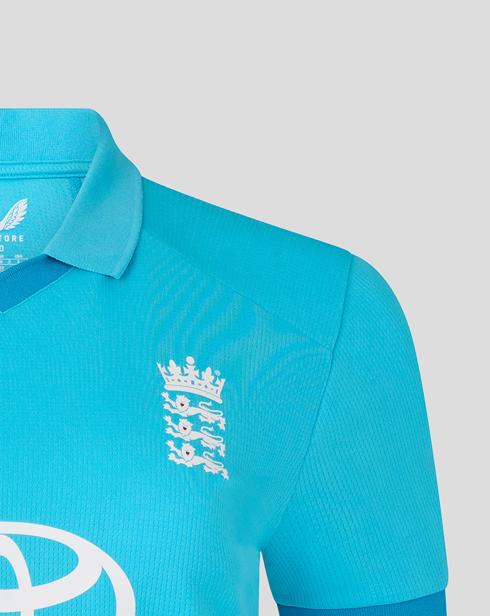Blue sports jersey with a logo on a light gray background