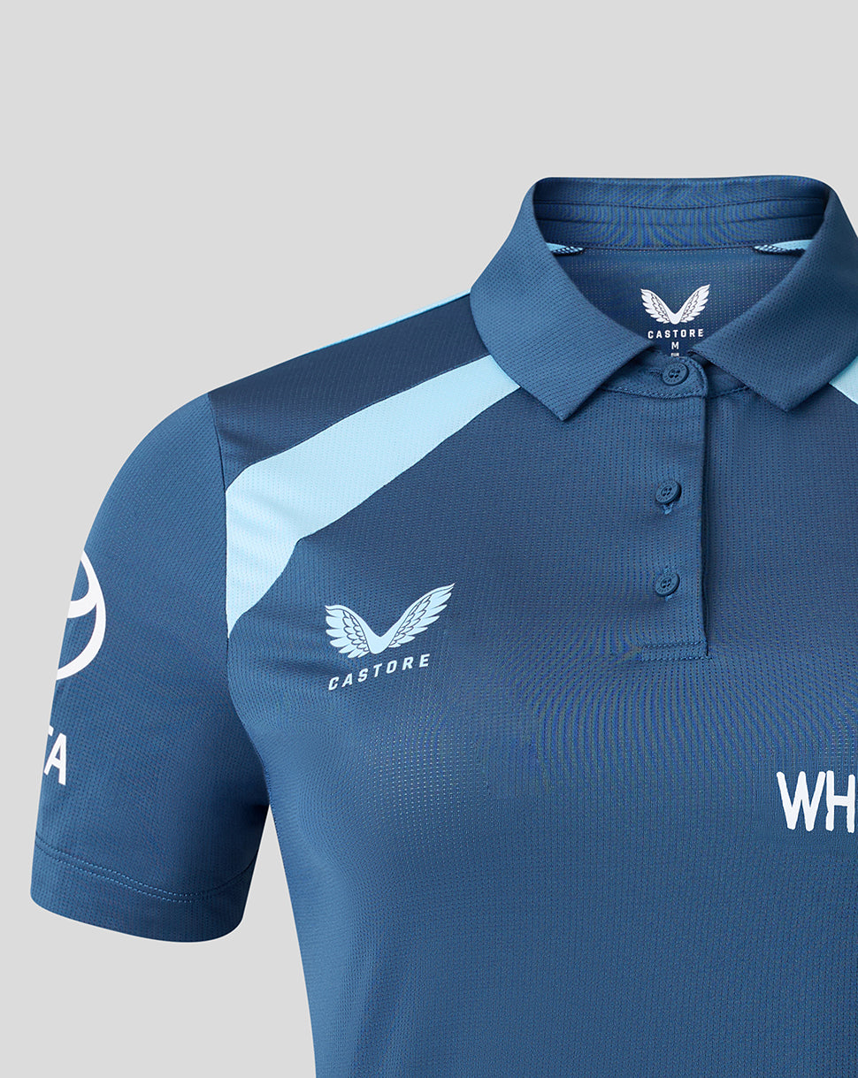 Blue polo shirt with light blue accents and Castore logo on a gray background