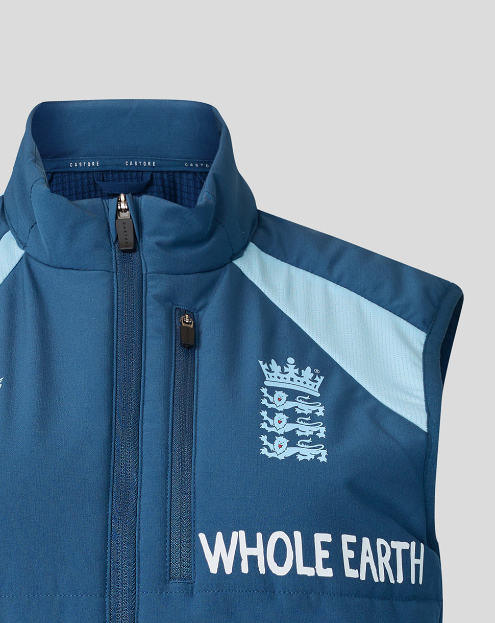 Blue sleeveless jacket with 'Whole Earth' branding on a gray background