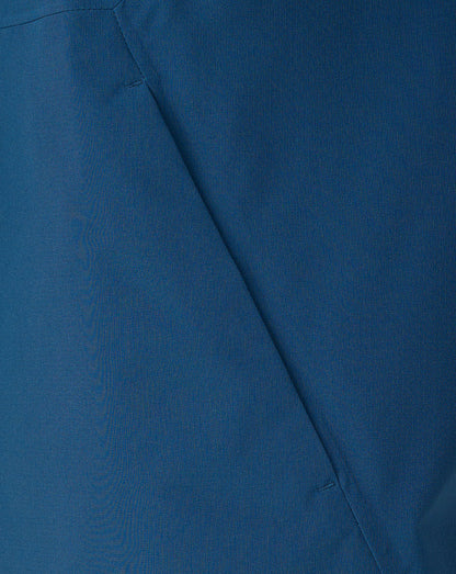 Close-up of blue fabric with a visible seam