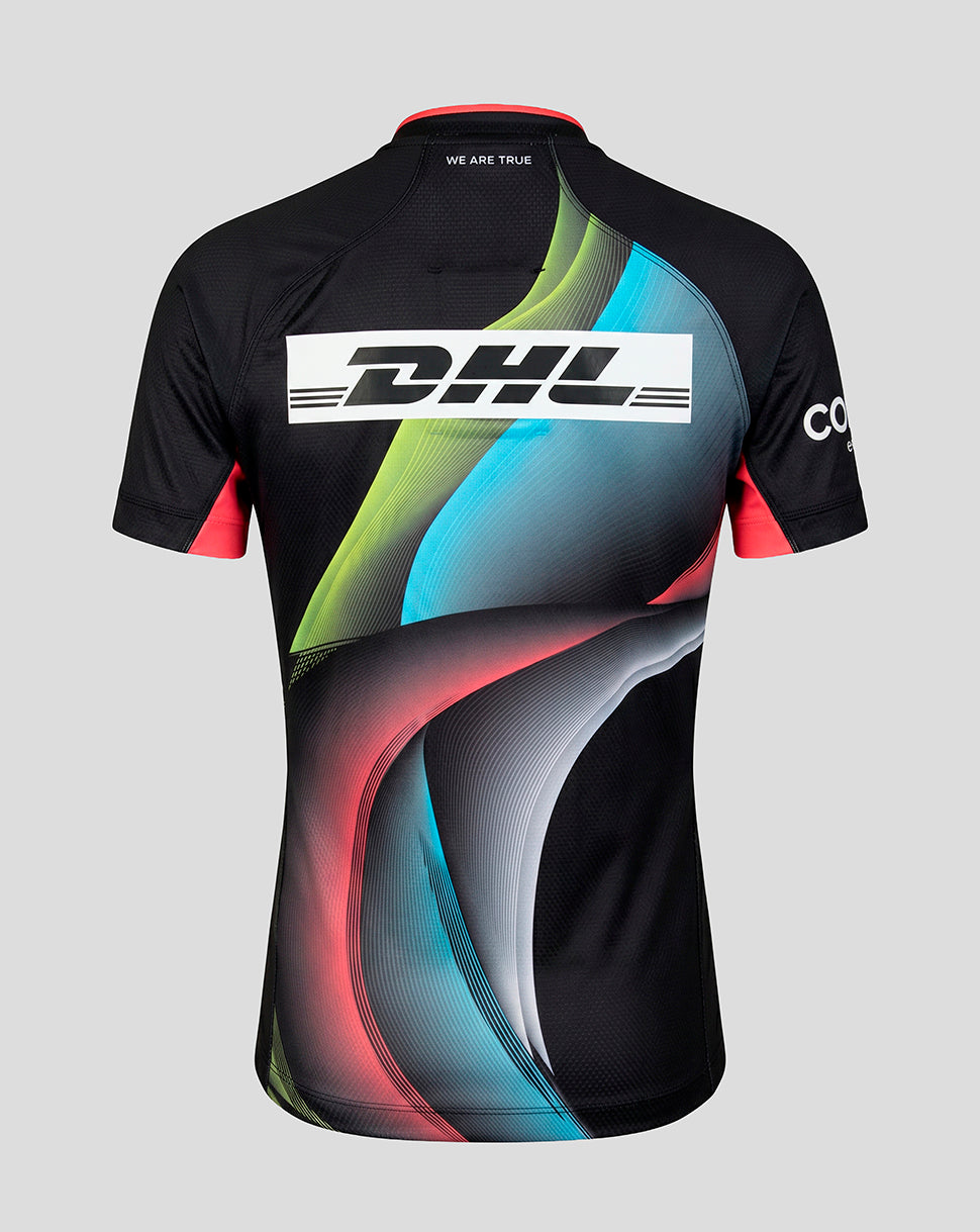 A short-sleeve athletic cycling jersey shown from the back, featuring a black base with vibrant abstract wave patterns in green, blue, pink, and gray, along with a large white DHL logo across the upper back.