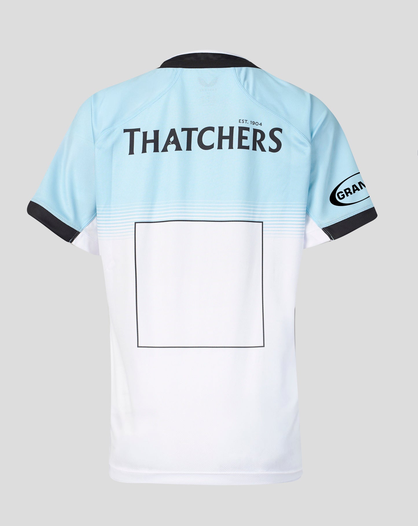 Back view of a light blue and white short-sleeve sports jersey with black trim, featuring 'THATCHERS' printed across the upper back and a blank rectangular patch on the lower back.