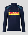 Navy long-sleeve athletic top with DHL logo on a light gray background