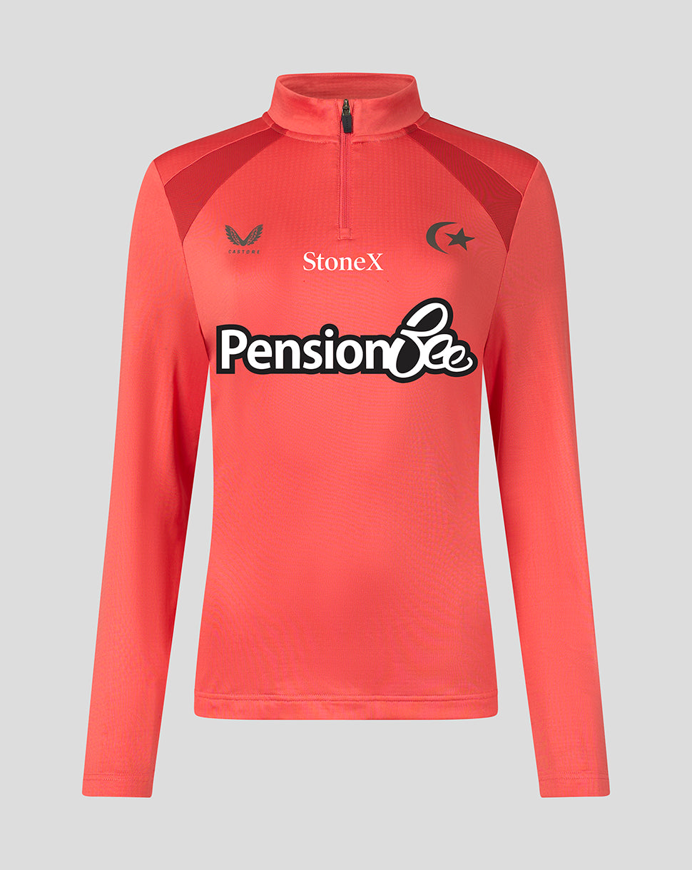 A coral pink long-sleeve athletic half-zip pullover with a mock neck, featuring the 'Pensionbee' logo across the chest, 'StoneX' on the right chest, and a Turkish flag emblem on the left chest, displayed on a solid gray background.