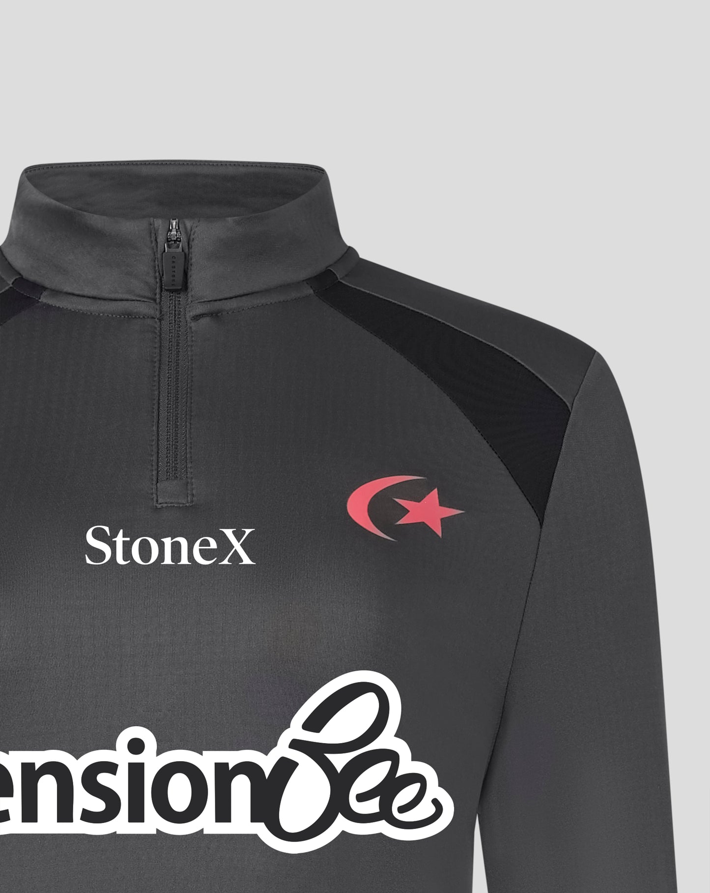 A close-up of a dark gray long-sleeve athletic quarter-zip top with a mock neck. The left chest features the white 'StoneX' brand name, and the right chest features a red crescent and star logo.
