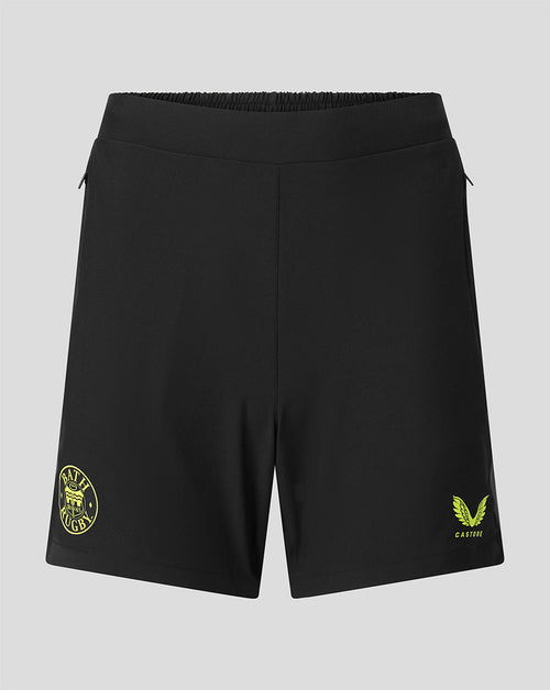 Black athletic shorts with yellow-green logo prints on the left and right legs, displayed against a neutral gray background.
