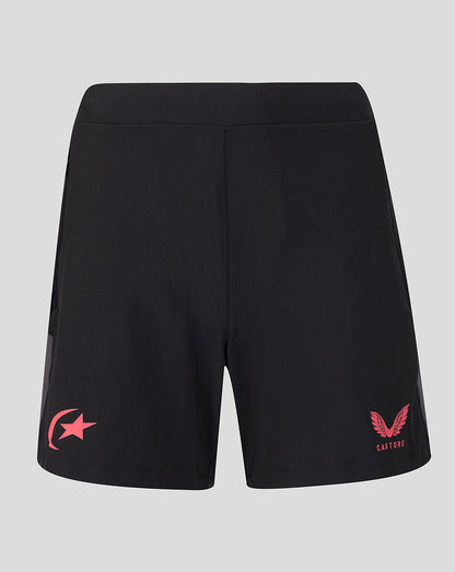 Black athletic shorts with a pink star logo on the left leg and a pink winged logo with 'Castore' text on the right leg, shown against a light gray background.