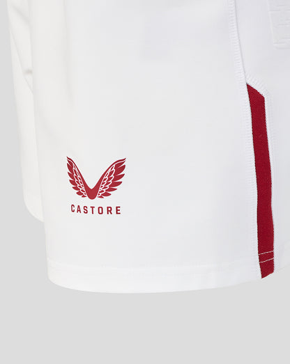 White sports jersey with red accents and 'Castore' logo on a light gray background